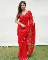 Majestic chikankari and handwork heavy georgette Cherry Red saree